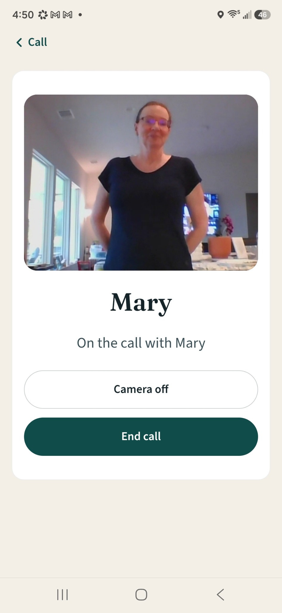 Caregiver call interface showing a connected video call with Camera off and End call controls